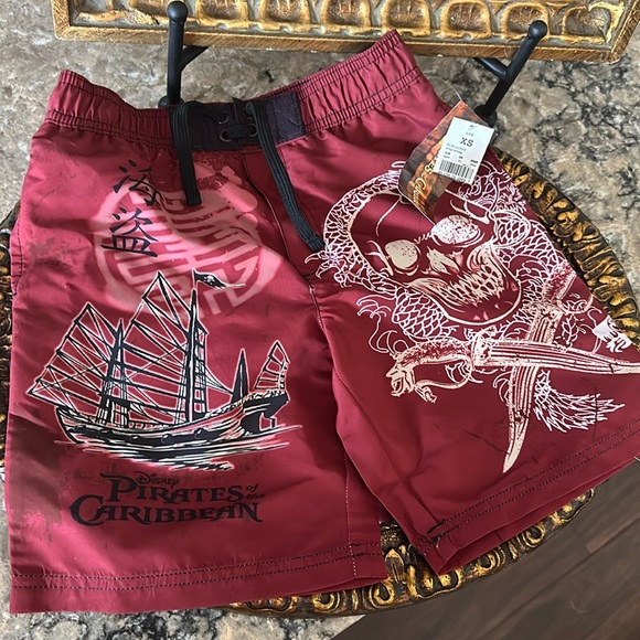 Disney Pirates of the Caribbean swim trunks sz xsmall burgundy New with tag - Picture 1 of 10